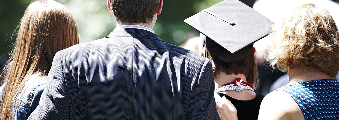 parents with recent grad at Commencement