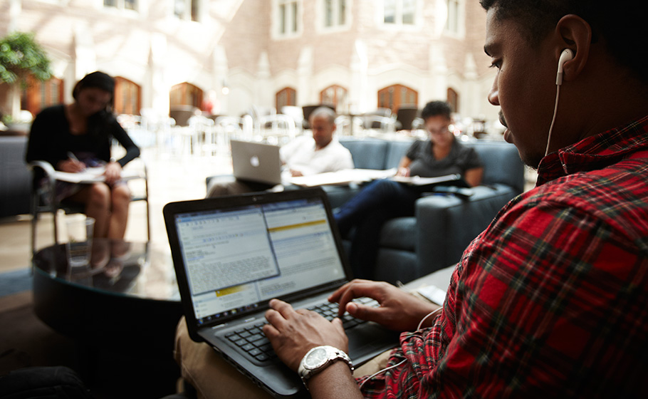 student using laptop