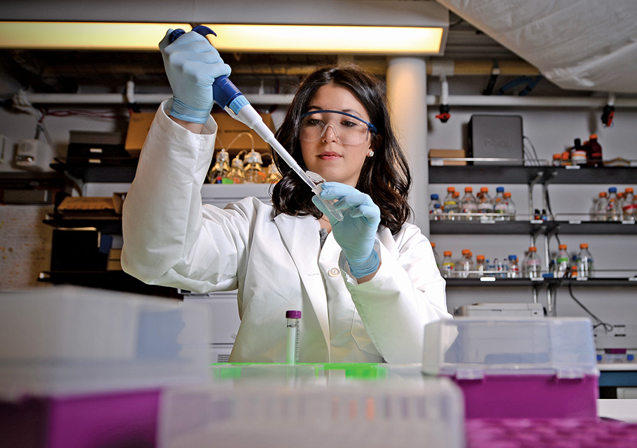 female research student in a lab